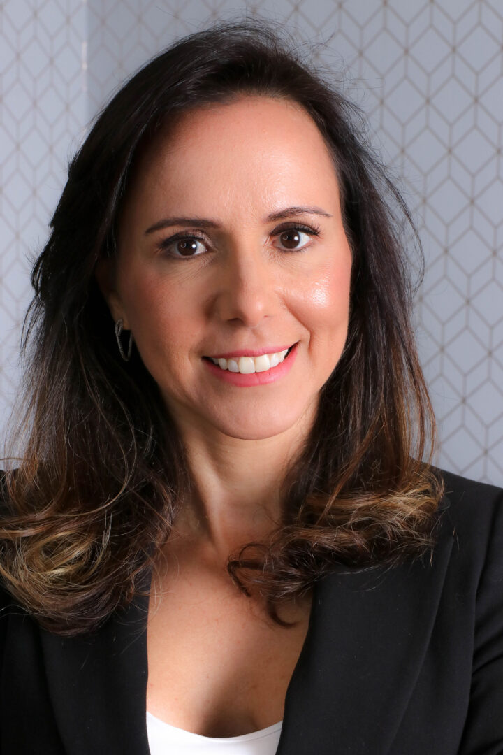 Foto de Kelli Angelini, entrevistada sobre Cyberbullying, sorrindo.