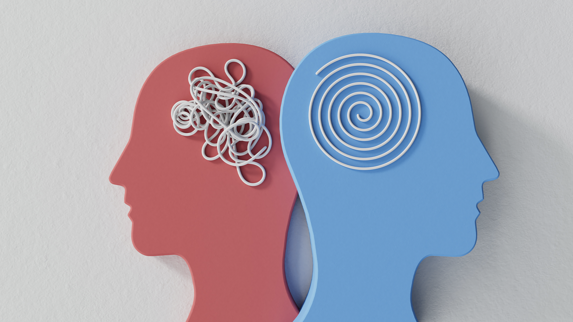 Imagem ilustrativa de dois perfis de cabeça, um com um nó representando confusão mental e o outro com um espiral indicando clareza mental, relacionada a saúde mental e psicologia.
