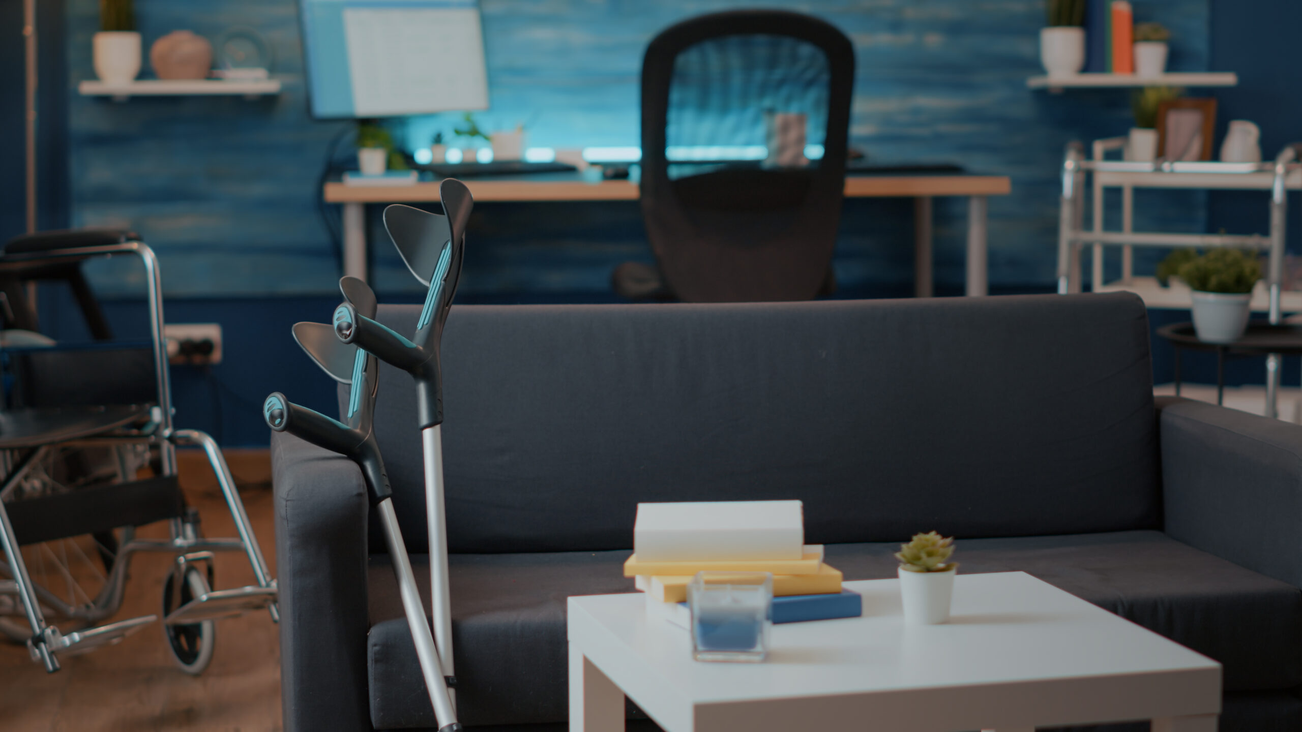Medical crutches on couch used by person with physical disability